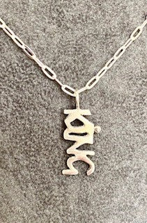 Sterling Silver 'King' Slogan charm.